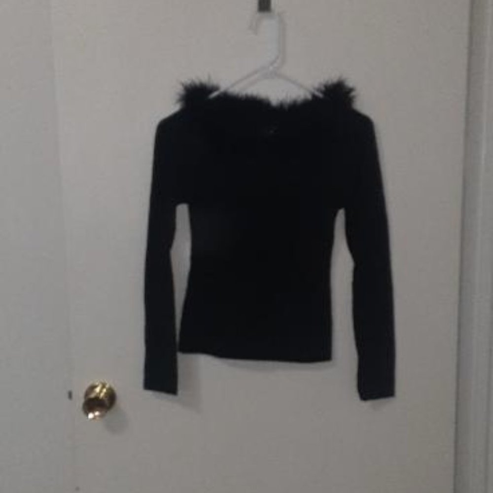 Womens long-sleeved black blouse with rounded feather neck